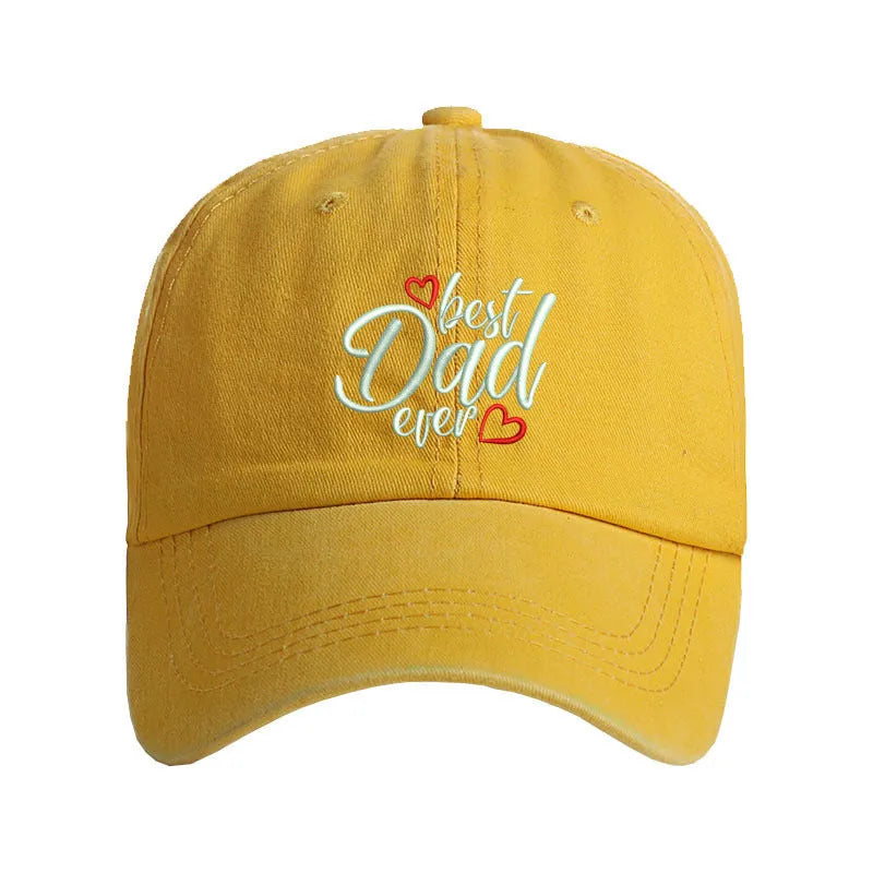 Washed cotton baseball cap with embroidered letters on dome crown, shown in adjustable fit.