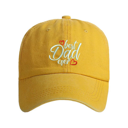 Washed cotton baseball cap with embroidered letters on dome crown, shown in adjustable fit.