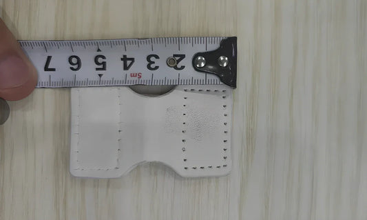 White silicone wristband accessories showing 19cm circumference and 2.5cm width dimensions