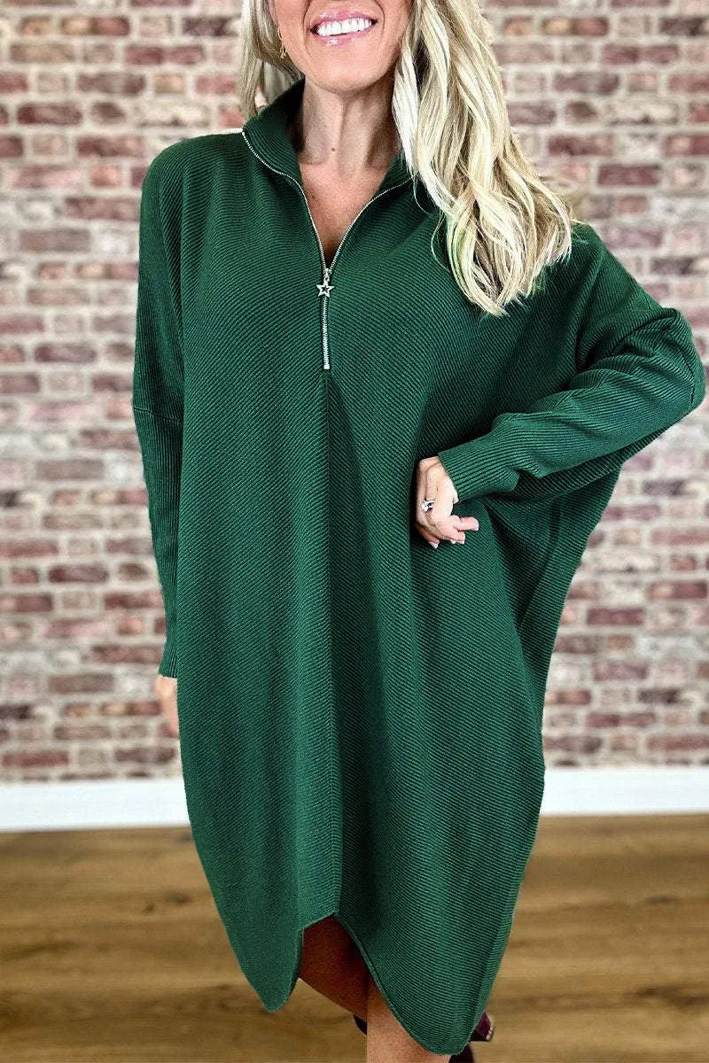 Women's solid colour loose knitted dress with a front zipper and raglan sleeves.