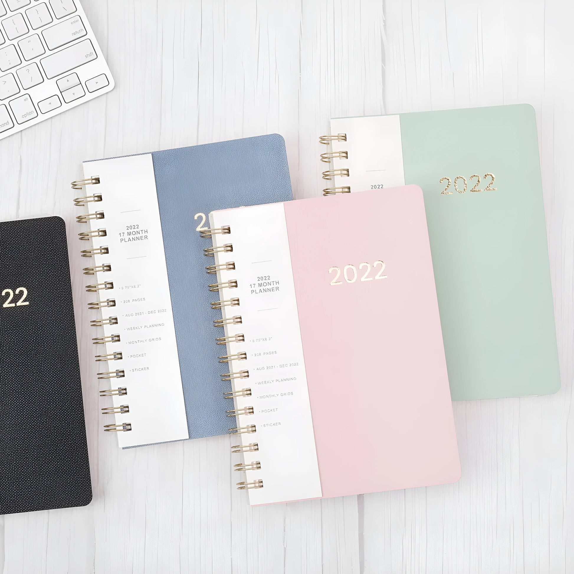 2022 week planner notebook with PU leather cover and coil binding, showing month grid pages