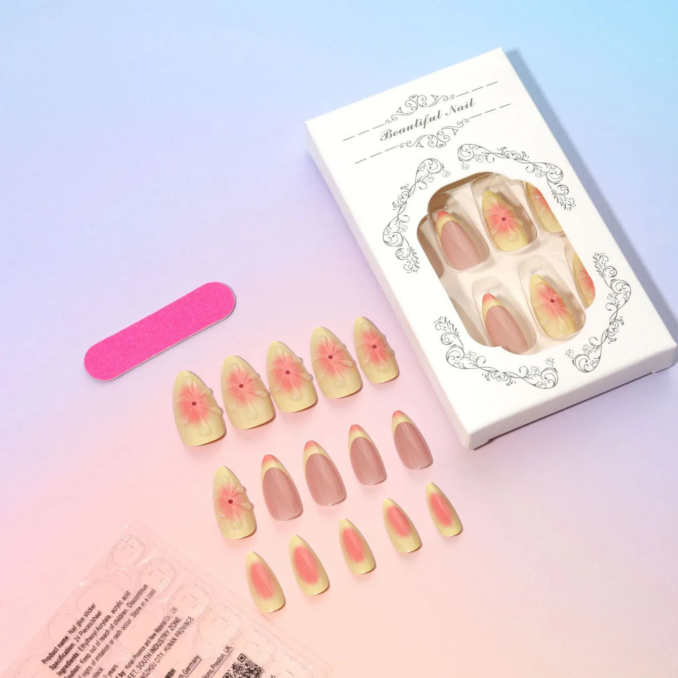 Set of simple fake nails with cartoon 3D flower design, jelly glue pot, and a nail file on a table.