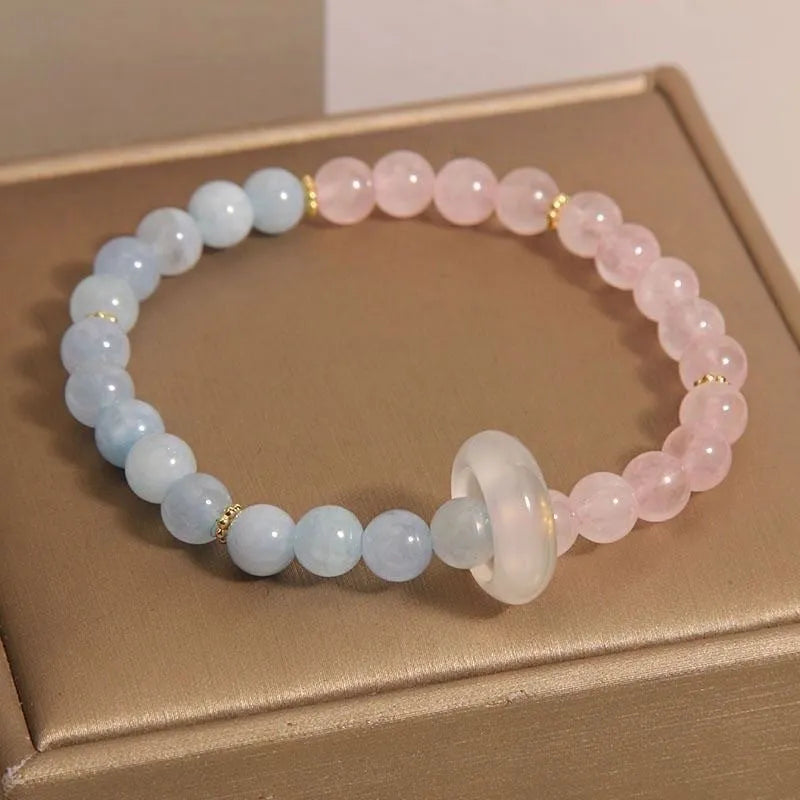 Aquamarine crystal bracelet with pink blue colour and geometric design elements
