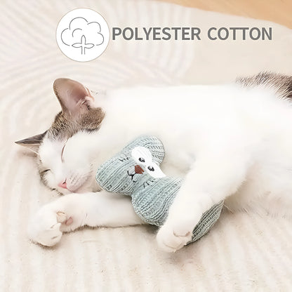 Cyan knitted plush cat toy with rope ends, shown next to a light coffee coloured version.