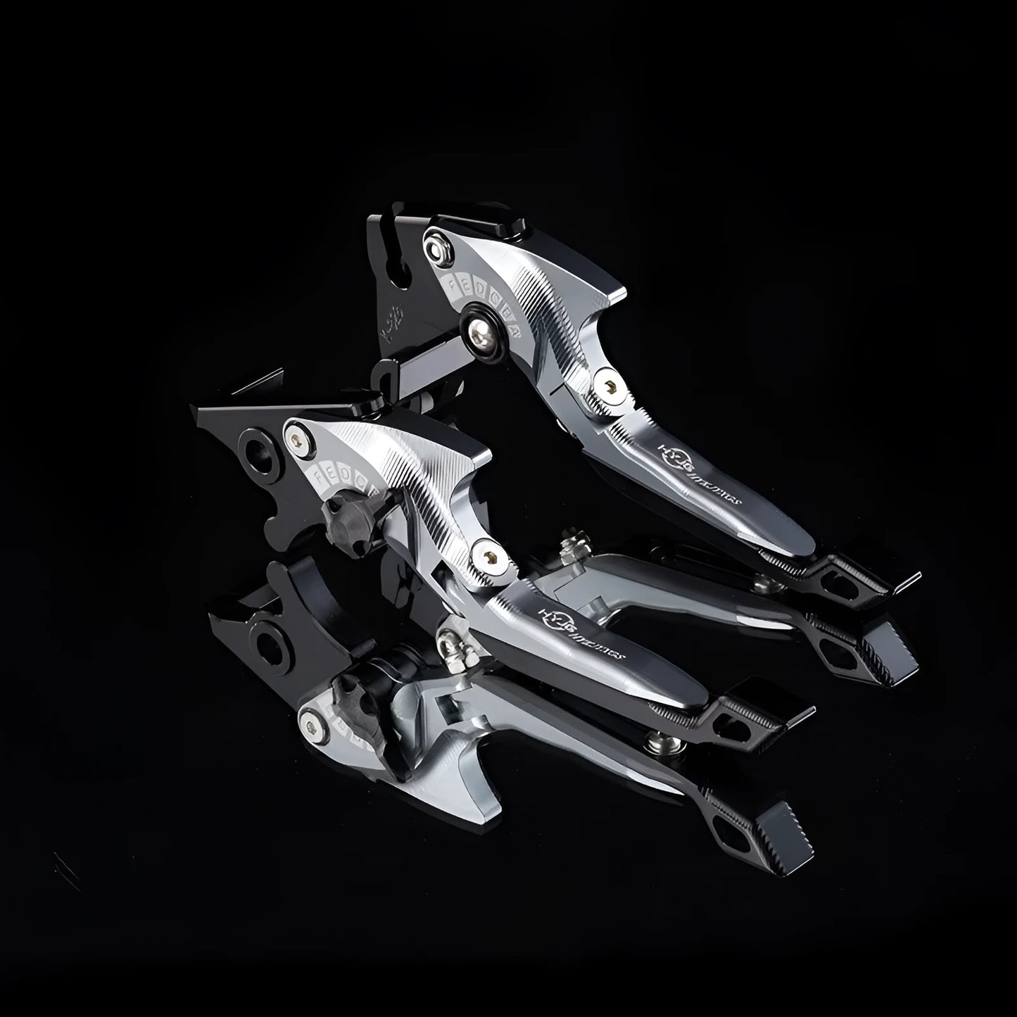 Pair of anodised metal bicycle brake horn handle levers with adjustable reach, shown in a two-tone colour finish.