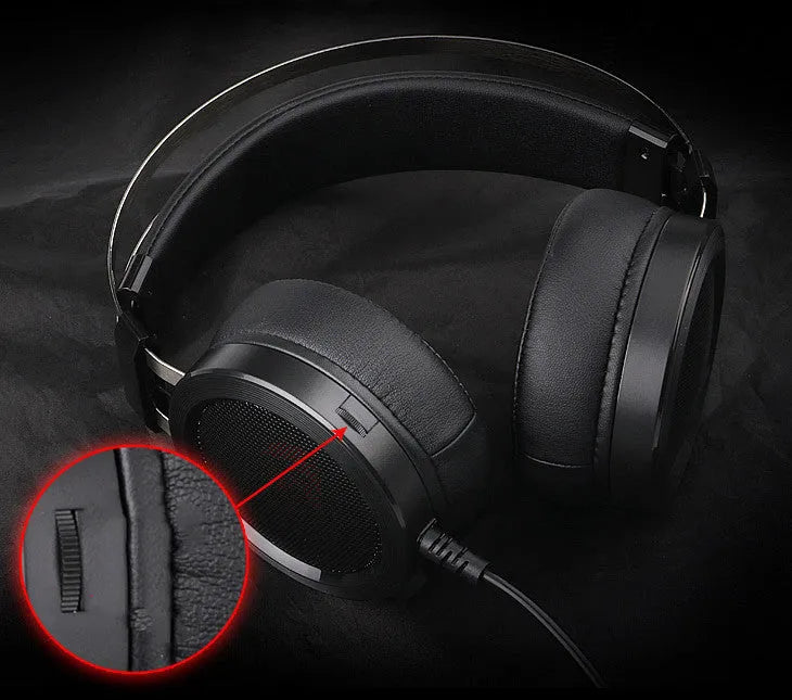 Black wired computer gaming headset with over-ear cups and a 3.5mm jack.