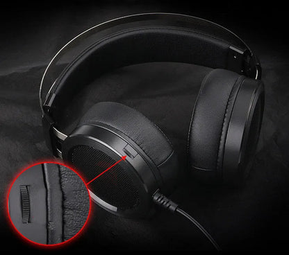 Black wired computer gaming headset with over-ear cups and a 3.5mm jack.