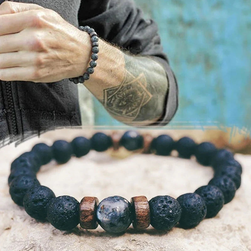 A stylish and durable men's bracelet made with volcanic stone, flash stone, and wood chips
