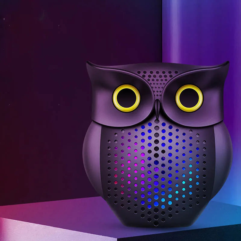 Black cartoon owl design wireless Bluetooth speaker measuring 4 inches tall with USB charging port