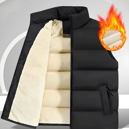 Men's striped lambswool vest in black, shown on a hanger.