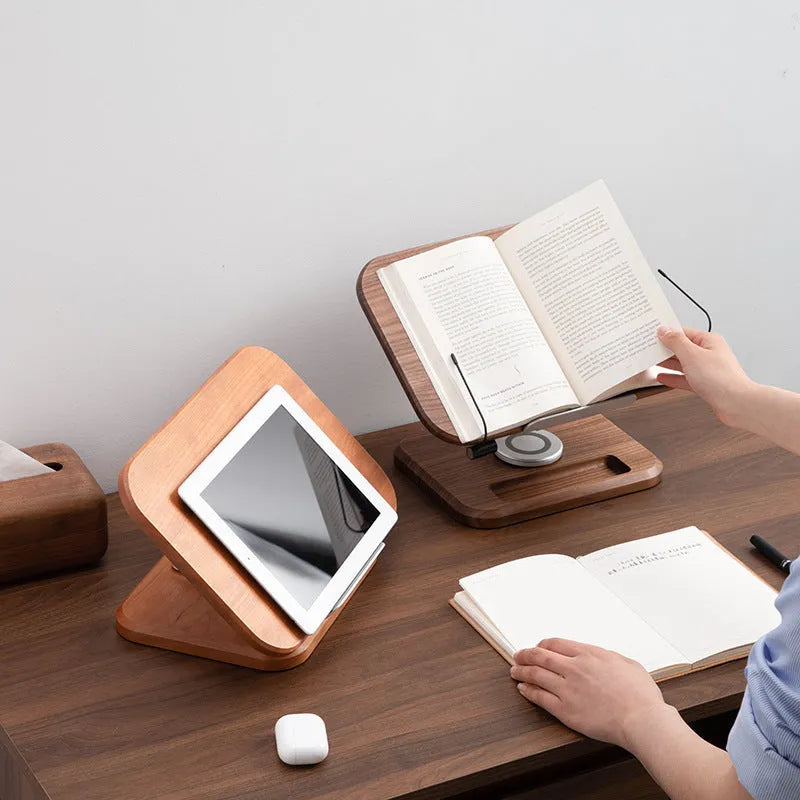 Walnut coloured solid wood adjustable reading rack with rotating base holding a book