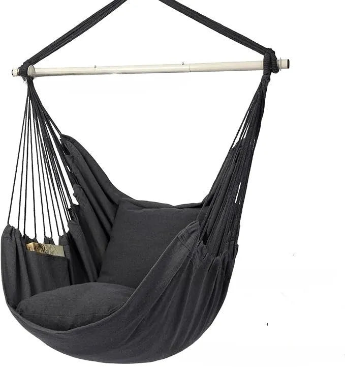 Folding outdoor tassel hammock in beige with canvas seat, cushion, and three-section iron pipe