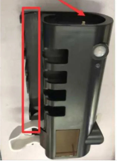 Black wall-mounted UV toothbrush steriliser with automatic toothpaste squeezer showing infrared sensor and solar panel