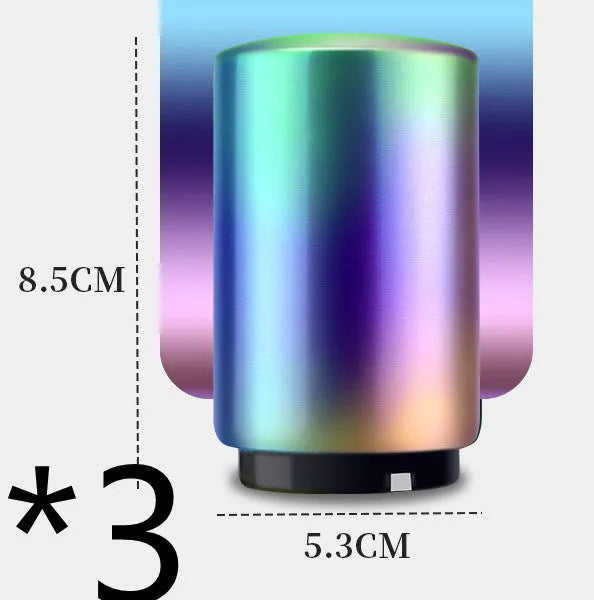 Stainless steel automatic bottle opener measuring 8.4 cm by 5.3 cm on a kitchen counter
