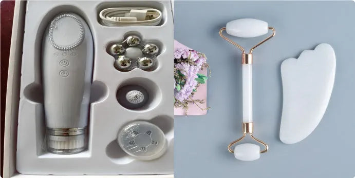 White jade facial roller with double-headed claw design and matching scraping board on dark surface