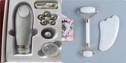White jade facial roller with double-headed claw design and matching scraping board on dark surface