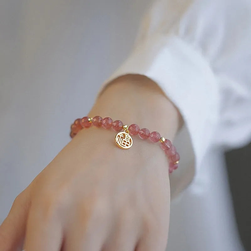 Handmade strawberry quartz blessing card bracelet with glass beads in new Chinese style.