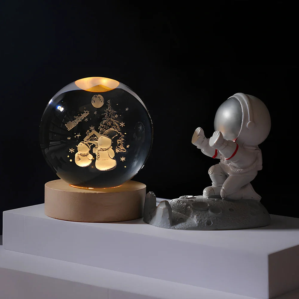 Cosmos Series crystal ball night light with wooden base and astronaut figure, showing Milky Way light pattern