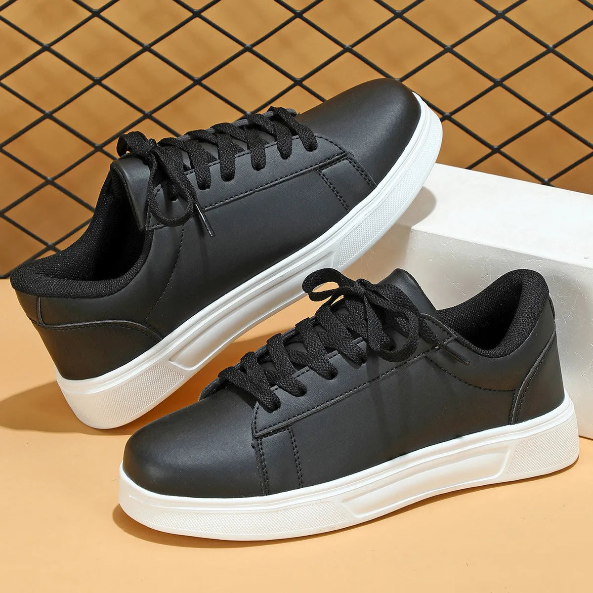 Casual beige brown platform skateboard sneakers with a low-top PU upper, round toe, and cross-strap detail