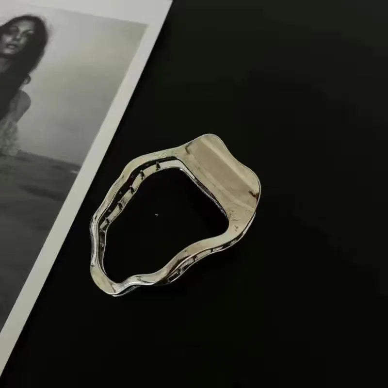 Women's zinc alloy hair barrettes in gold and silver with square, arc, and triangle shapes