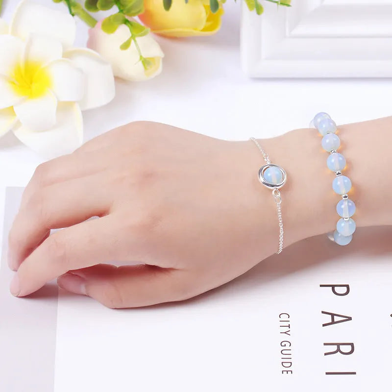 Double-layer women's bracelet with lucky beads and colourful crystals in gold-toned setting