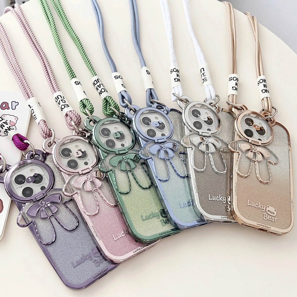 Electroplating glitter phone case with lucky bear bracket and crossbody bag element in Dark Night Purple, Gold or Pink