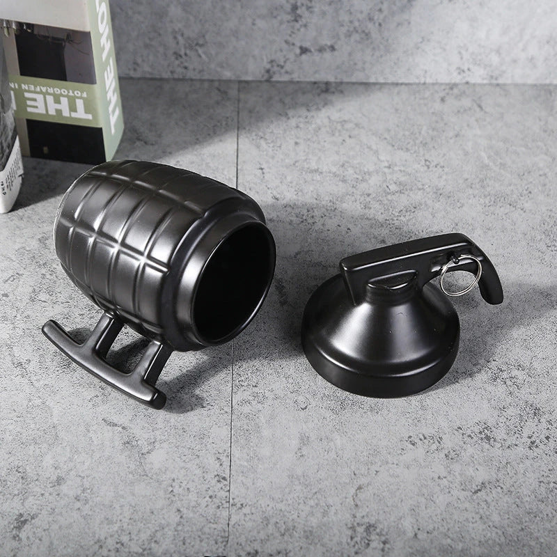 Stylish and durable grenade-shaped ceramic coffee mug with a secure lid, perfect for outdoor adventures and office use.
