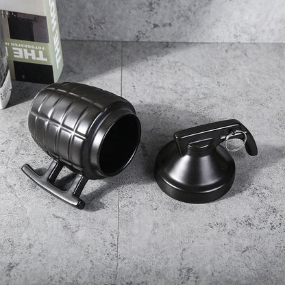 Stylish and durable grenade-shaped ceramic coffee mug with a secure lid, perfect for outdoor adventures and office use.