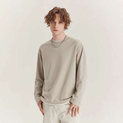 Men's loose long-sleeved cotton blend t-shirt in black, round neck, casual style.
