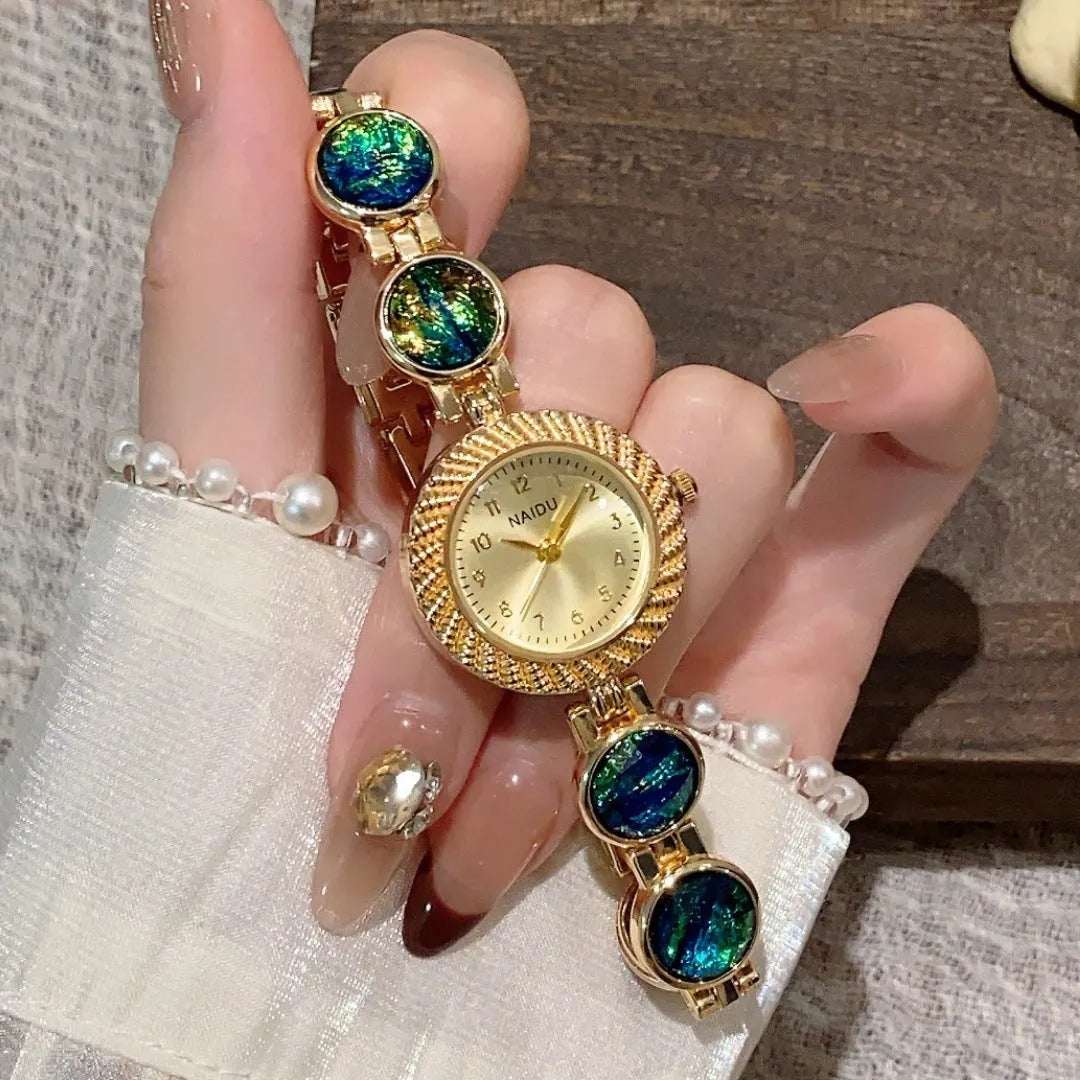 Women's quartz watch with 25mm round dial in a choice of six colours including Milky White, Dark Green, and Cherry Pink.