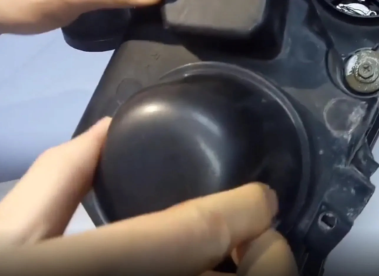 Black silicone 90mm diameter car LED headlight rear dust cover for General Motors vehicles.