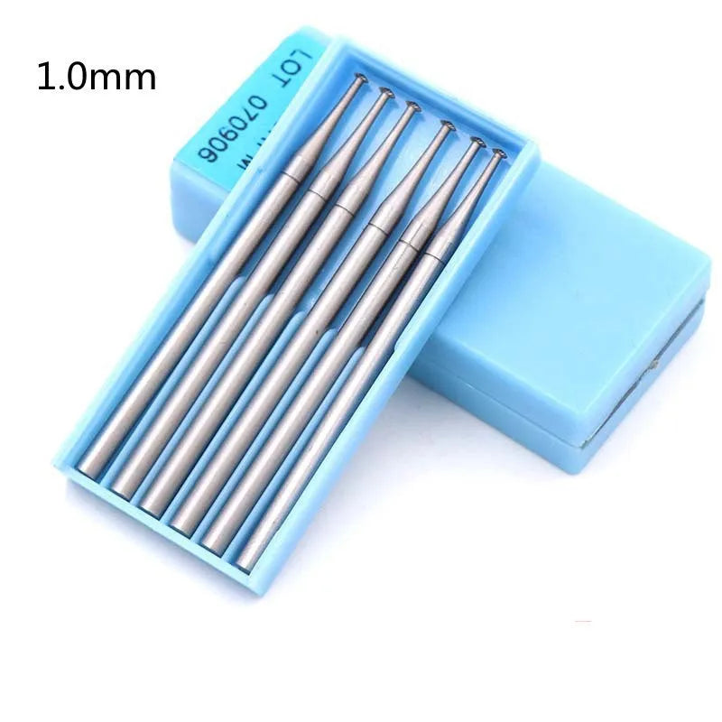 Blue box containing six tungsten steel carving milling cutter grinding heads with thin disc needle shapes and 2.35mm mandrels.