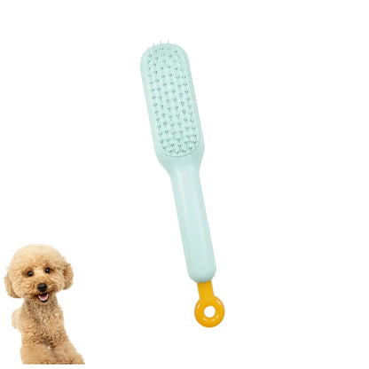 Dual-sided small dog grooming brush showing pin brush and soft bristle brush sides, in blue colour.