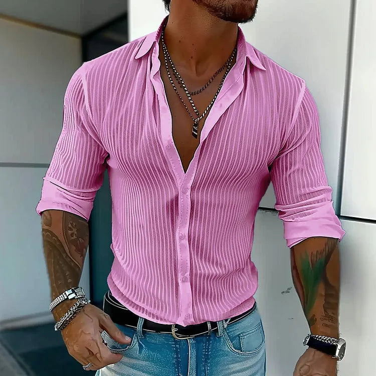Man wearing a loose fit plain colour striped long sleeve cardigan shirt.