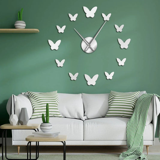 Round 30cm mirror wall clock with raised butterfly design showing time display
