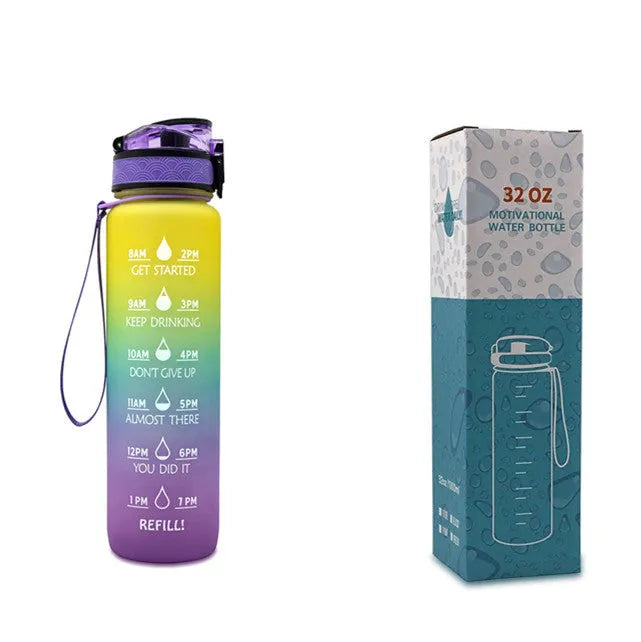 Blue and red gradient 1 litre Tritan sports water bottle with time markers and a flip-top lid.