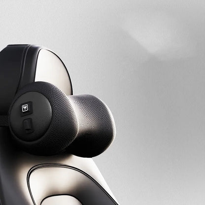 Black car massage cushion with headrest and lumbar support on a car seat, showing wired controller.