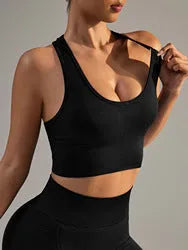 Black women's sports bra with fixed double shoulder straps and a full cup design on a mannequin.