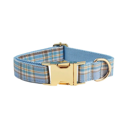 Sky blue grid forest pattern dog collar, leash, bow, and vest four-piece pet accessory set