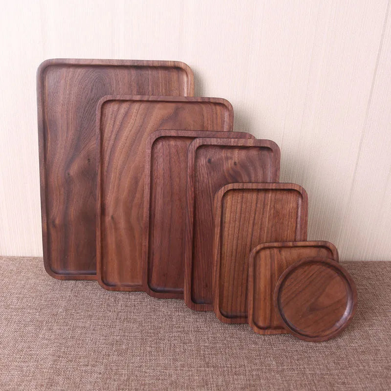 Japanese style wooden black walnut rectangular dinner plate available in multiple sizes from 12cm diameter to 34x23cm with choice of hand-painted plain surface and either whole wood construction or wood splicing style for minimalist tableware