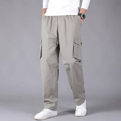 Loose straight leg cotton cargo trousers with multi-pocket, mid waist, zip placket, in black, army green, khaki, or natural yellow.