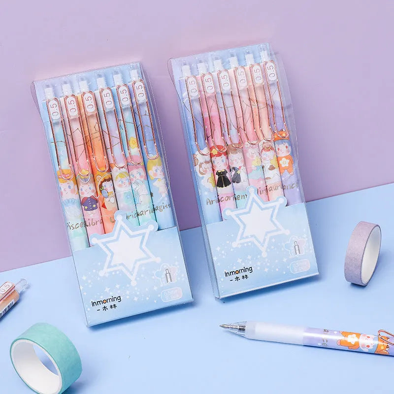 Six Lisa's Secret Constellation press gel pens showing 0.5mm tips and star pattern designs on plastic barrels