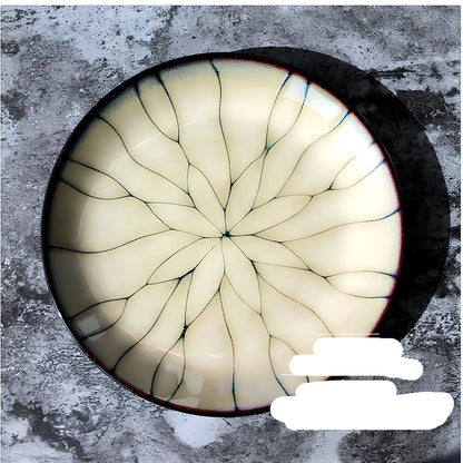 Japanese porcelain round plate 21cm diameter with underglaze design, deep bowl variant and 27.8cm serving size