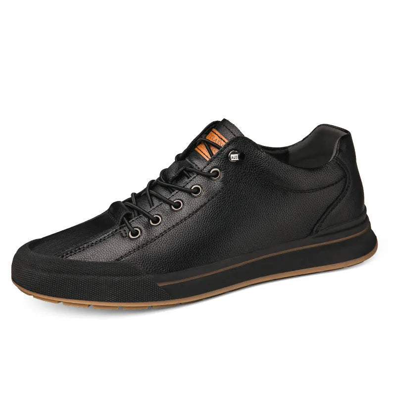Men's classic white and black matte leather plimsolls with round toe and flat 6CM heel on a plain background.