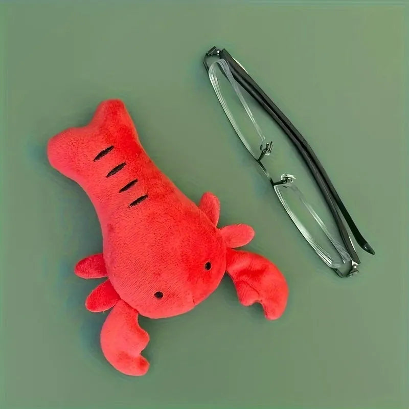 Red crab lobster shaped squeaky stuffed dog toy for small and medium breeds on a white background.