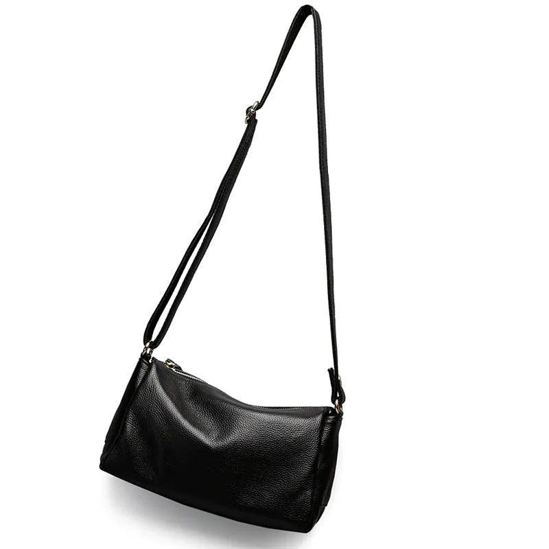 Soft genuine cowhide leather women's crossbody bag in horizontal square shape on a single strap.