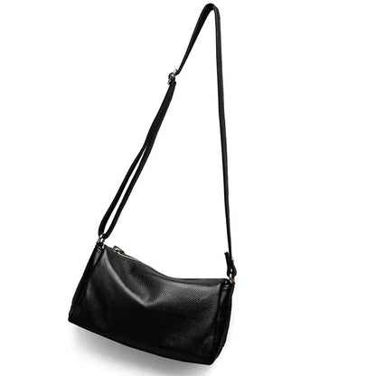 Soft genuine cowhide leather women's crossbody bag in horizontal square shape on a single strap.