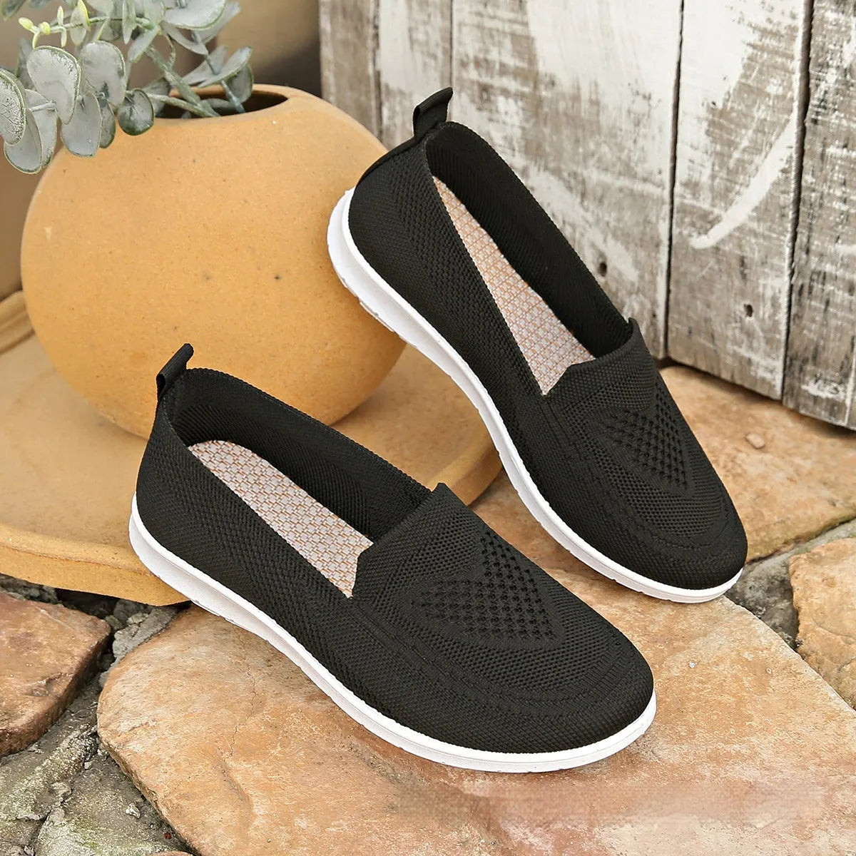 Plus size women's beige casual cloth shoes with low top, flat heel, and heart pattern.