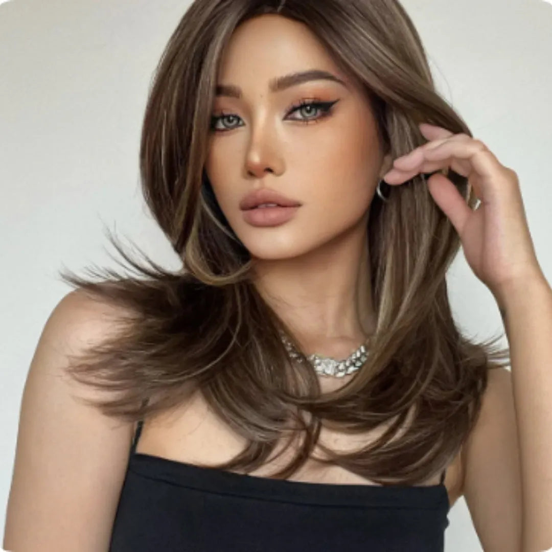 Mid-length full-head wig with platinum gradient colour, long curly hair, and bangs in star fashion style
