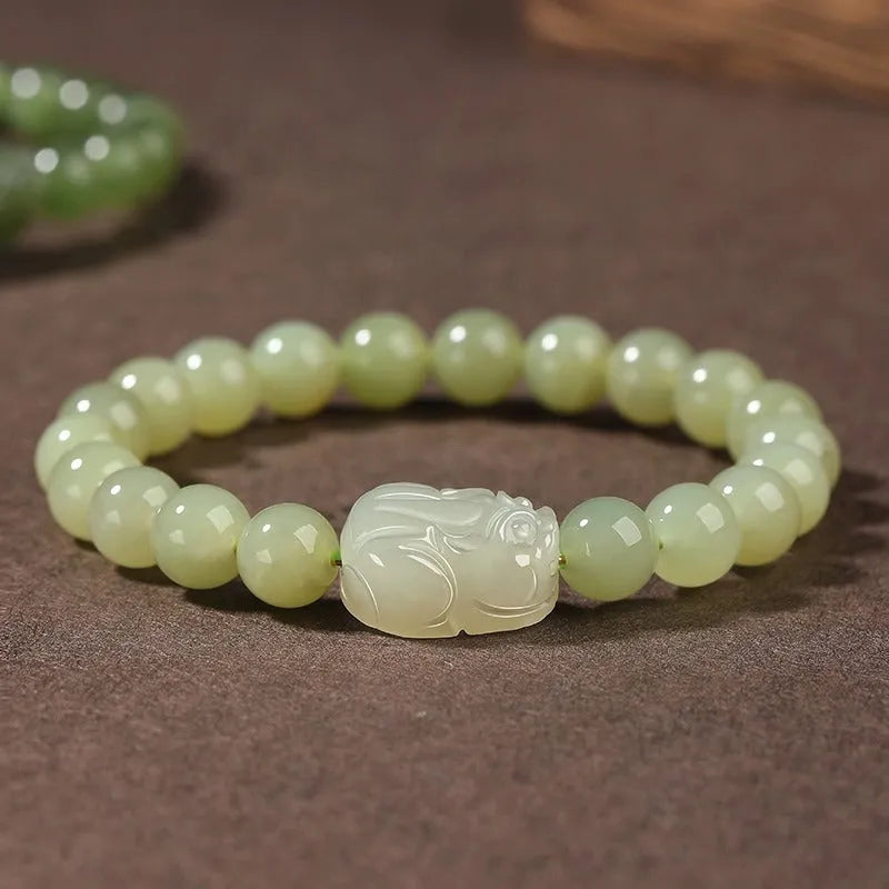 Women's polished Hetian jade ethnic bracelet showing 6mm, 8mm, and 10mm bead size options.